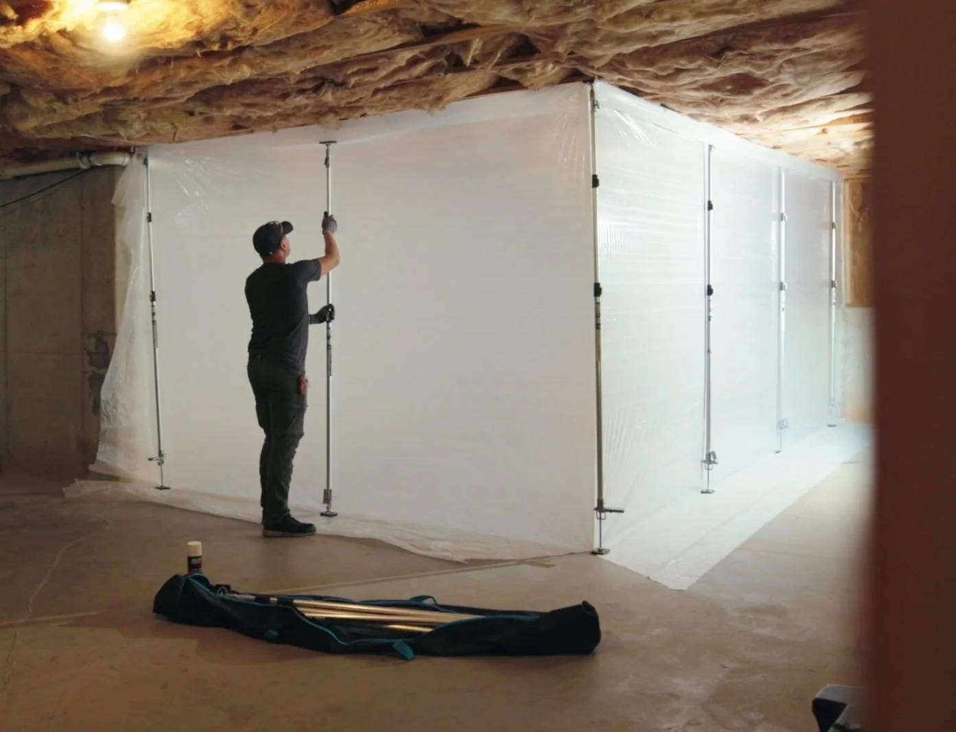 Containment barriers set up for mold remediation